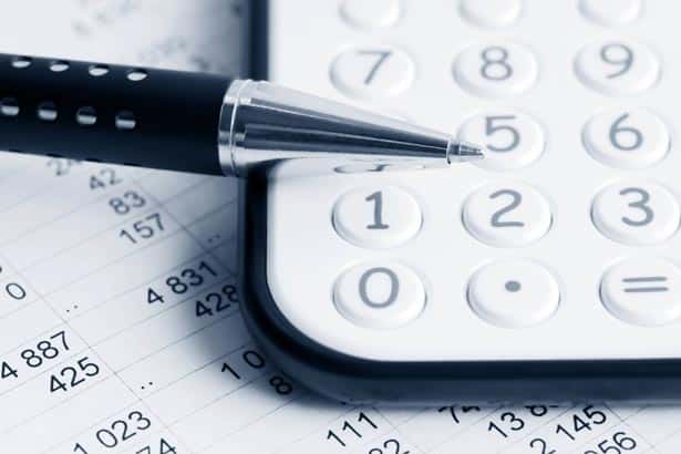 Calculator, Pen And Accounting Sheet Closeup